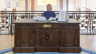 While the World Burned, Hillary Clinton Read Her Emails